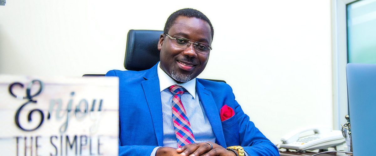 Image of Nana Yaw Kesse (this brand guy) sitting at a desk